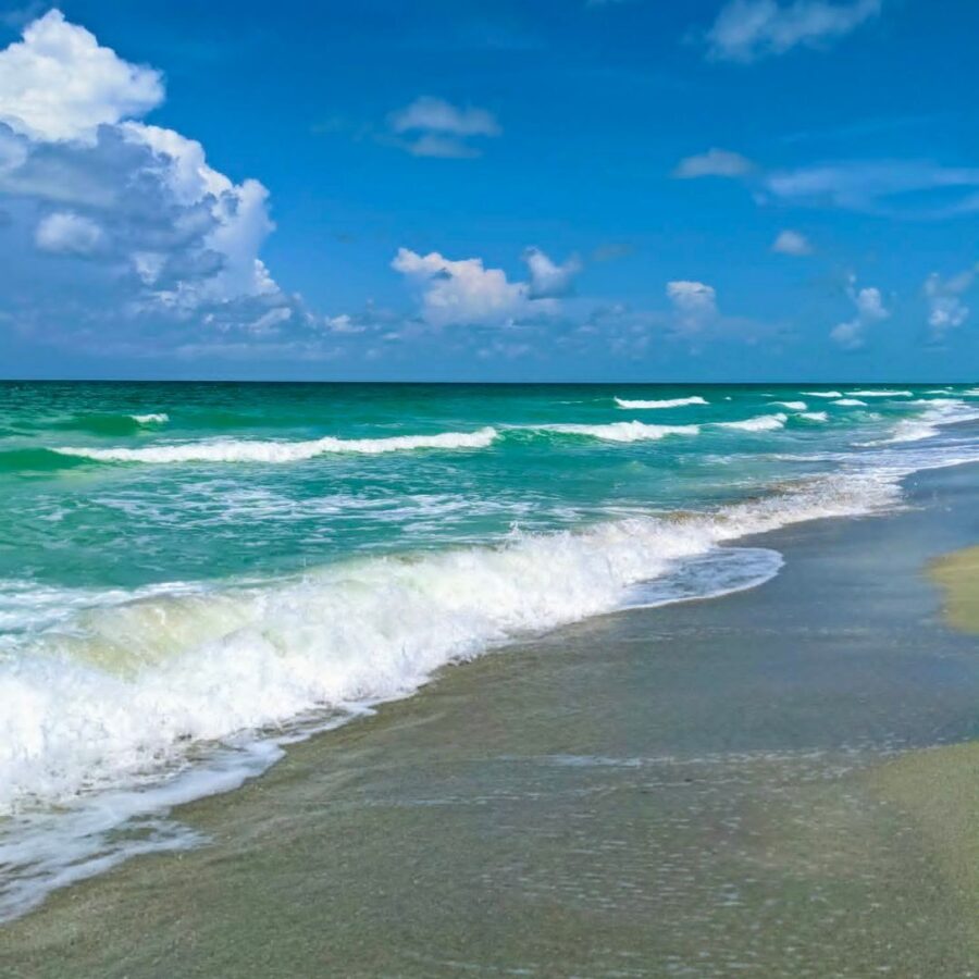 waves on beach, blue sky